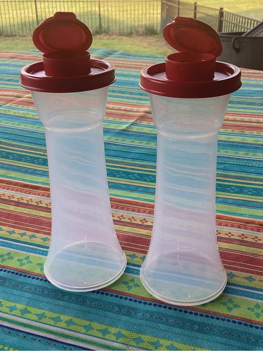 Tupperware Salt and Pepper Shakers - one set in Red
